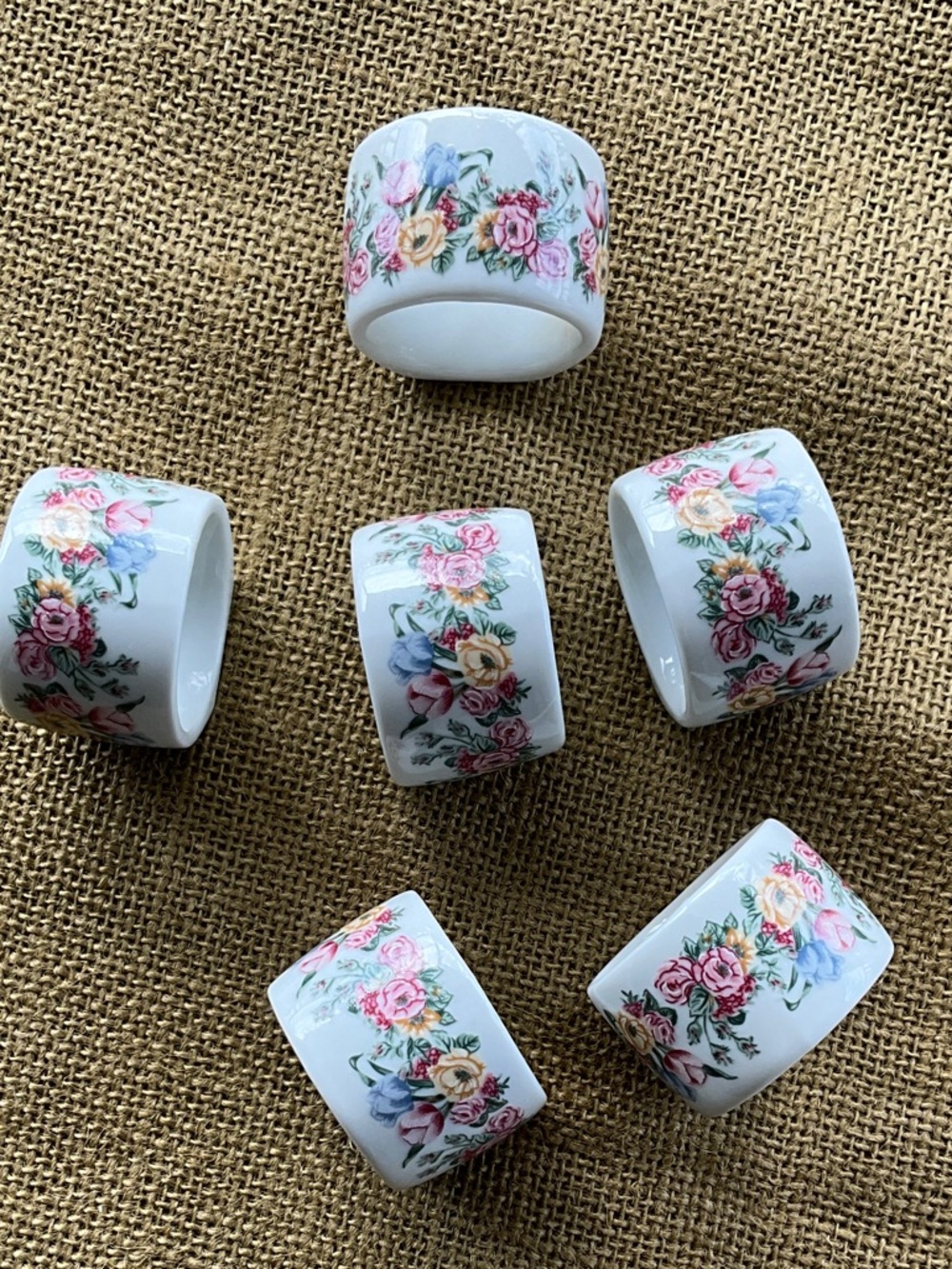 Bill blass White Porcelain Napkin Rings with Pink, Blue & Yellow Floral Decal